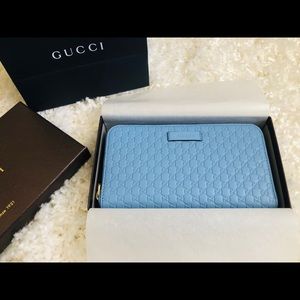 Sold Gucci microguccissima zip wallet mineral blue